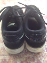 Nike Black & White Cleats Size 4