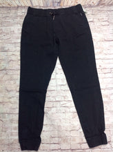Ring of Fire Black Solid Pants